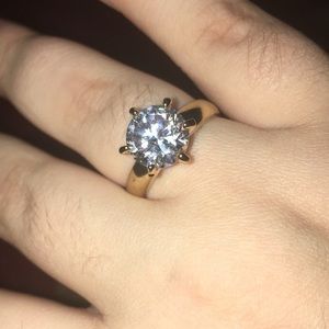 A gold diamond ring that sparkles in the light!!